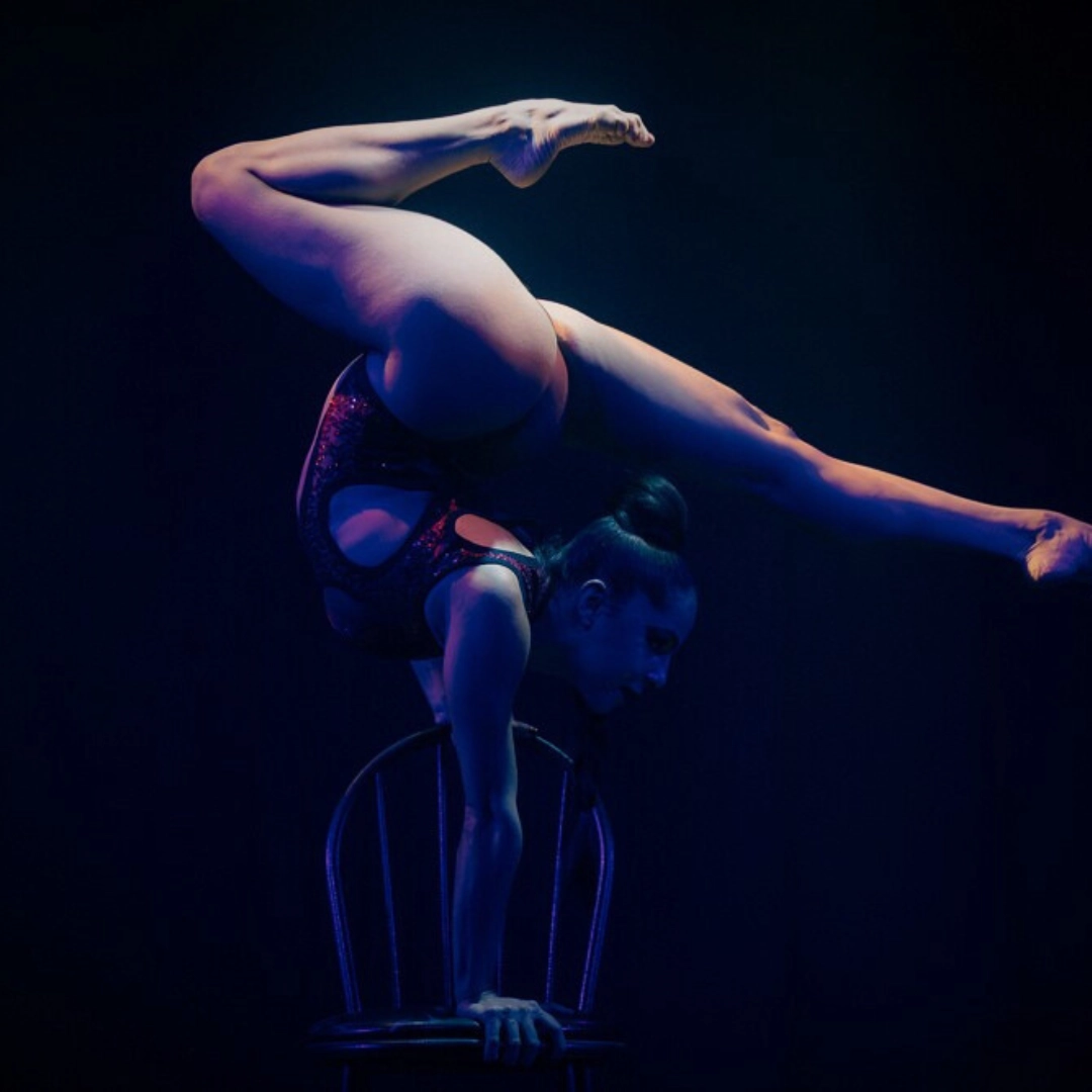 A woman doing a handstand - AirOtic Soirée in Lisbon